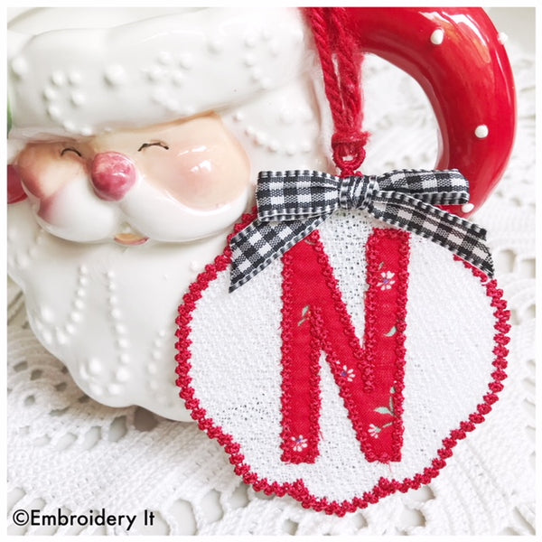 Applique Christmas ornament on freestanding lace with monogram