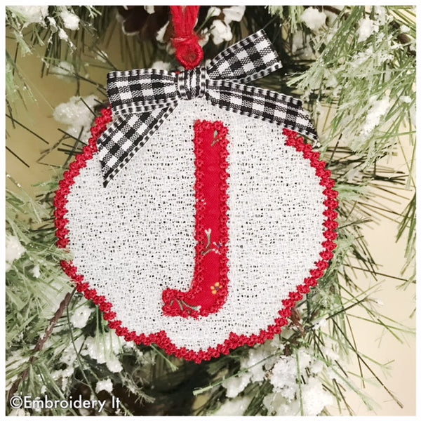 Machine embroidery letter J freestanding lace pattern