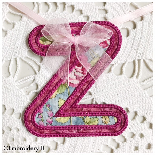 machine embroidered banner letter