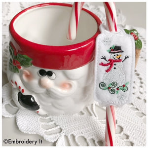 Snowman candy cane slider machine embroidery in the hoop design
