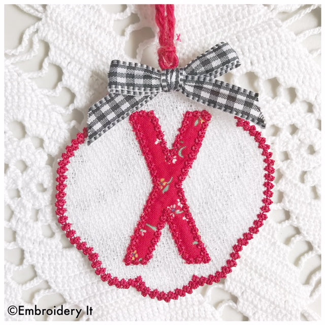 Machine embroidery free standing lace letter X Christmas ornament